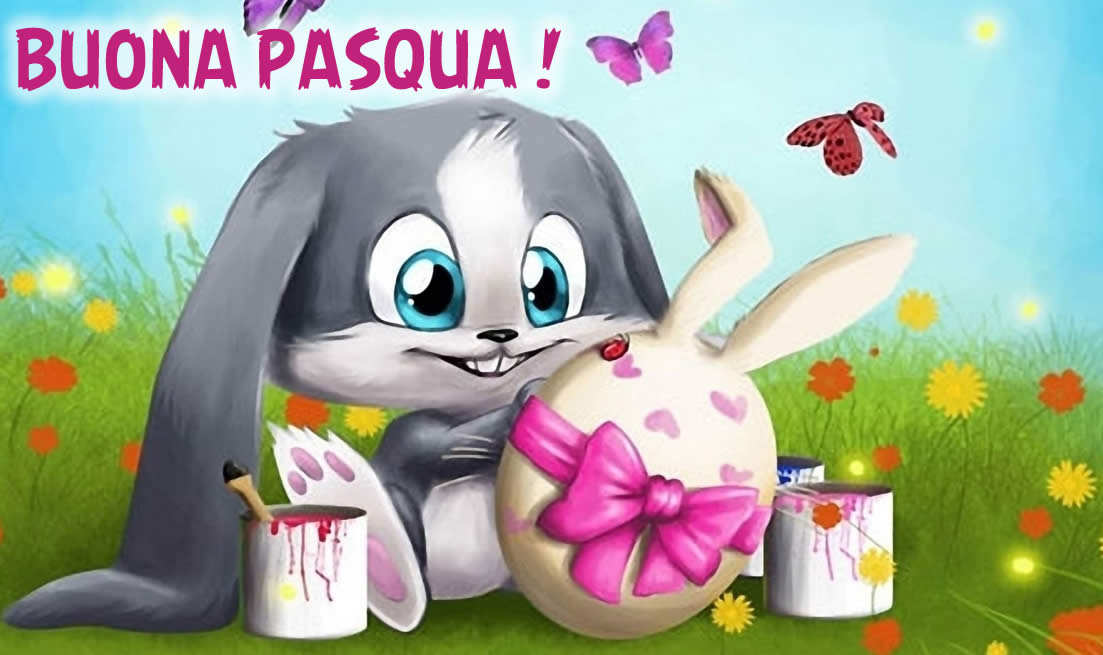 Immagine con simpatico coniglietto che dipinge uova di Pasqua, con testo di auguri.